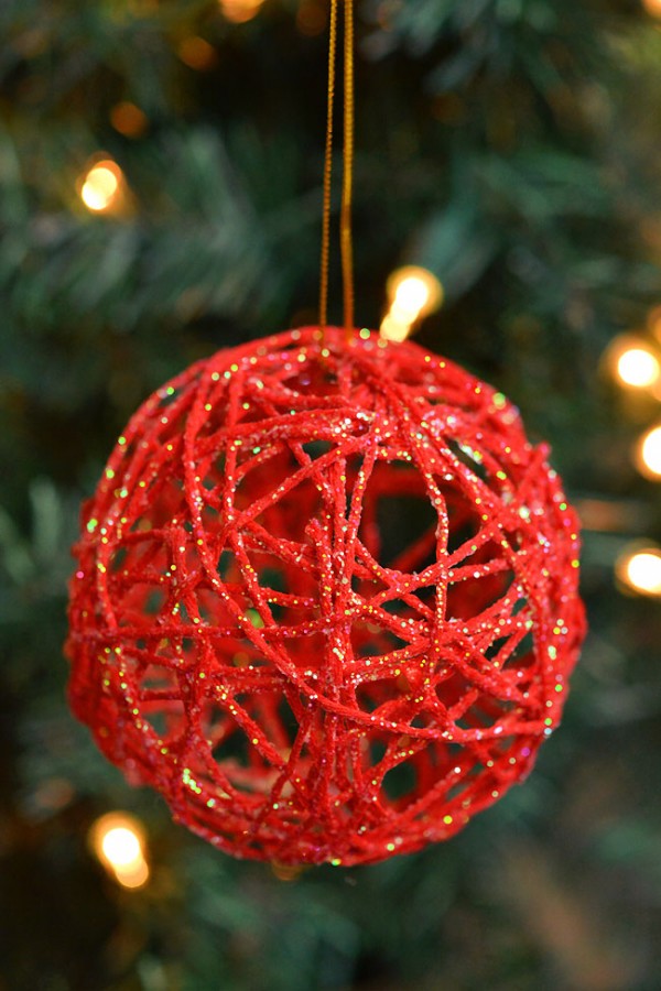 Pretty and glittery red ball yarn ornament