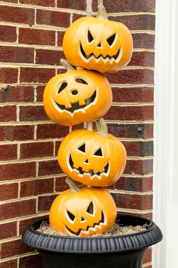 stacked pumpkin topiary is the cutest Halloween decoration for the front porch