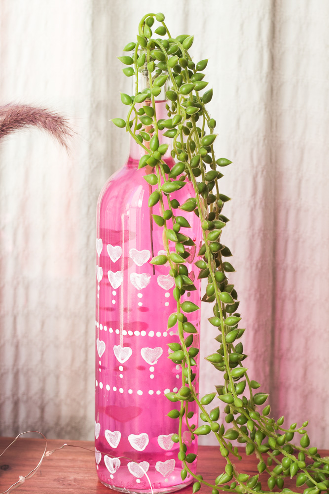 Bohemian wine bottle vase with heart and dots details