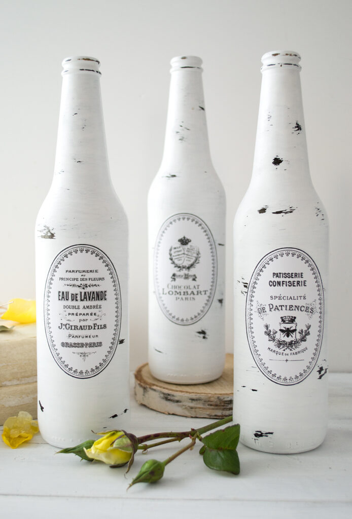 French bottles painted in white with amazing oval labels