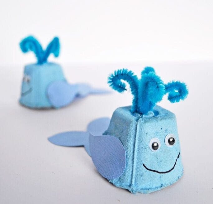 Whale craft made of egg carton, pipe cleaner, and googly eyes
