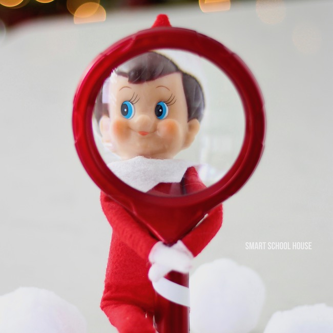 Elf on the Shelf with a Magnifying Glass