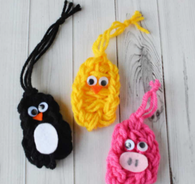 Finger knitted penguin, pig and chick