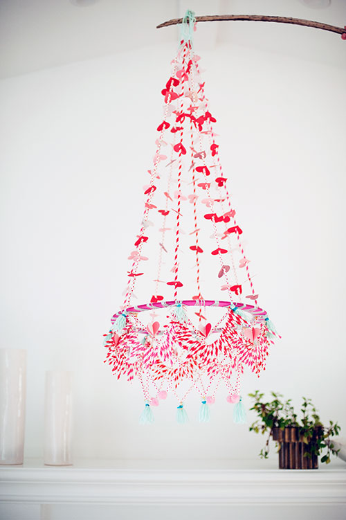 Valentine’s Day Polish chandelier decor piece complete with globs of hearts and straws