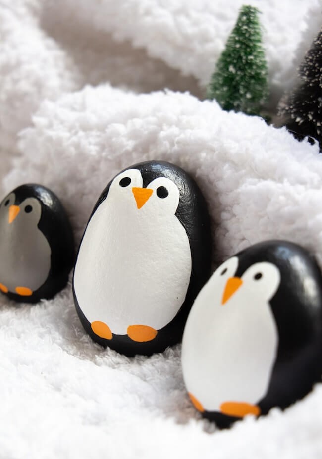 adorable family of Penguin Painted Rocks