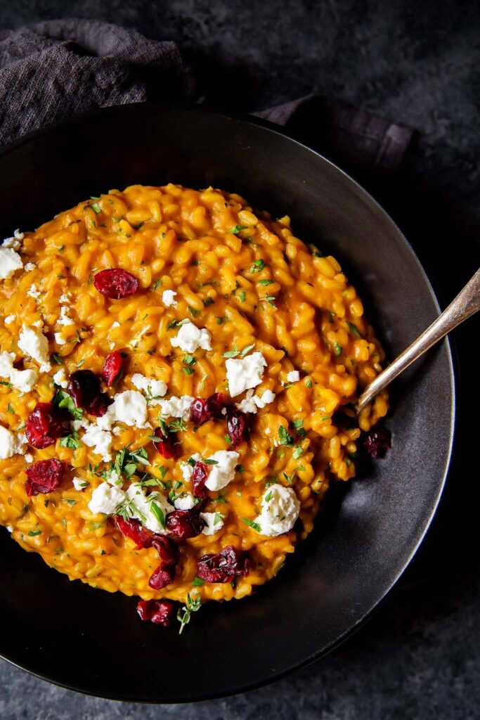 Pumpkin Risotto with Goat Cheese & Dried Cranberries is a Rich and creamy comfort food for weeknights