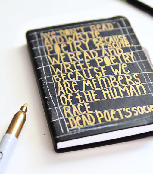 Sharpie journals with text o it saying We don't read and write Poetry because it's cute. We read and write poetry because we are member's of the human race. -Dead Poet's society