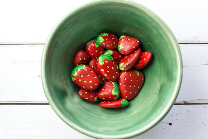 Strawberry painted rocks