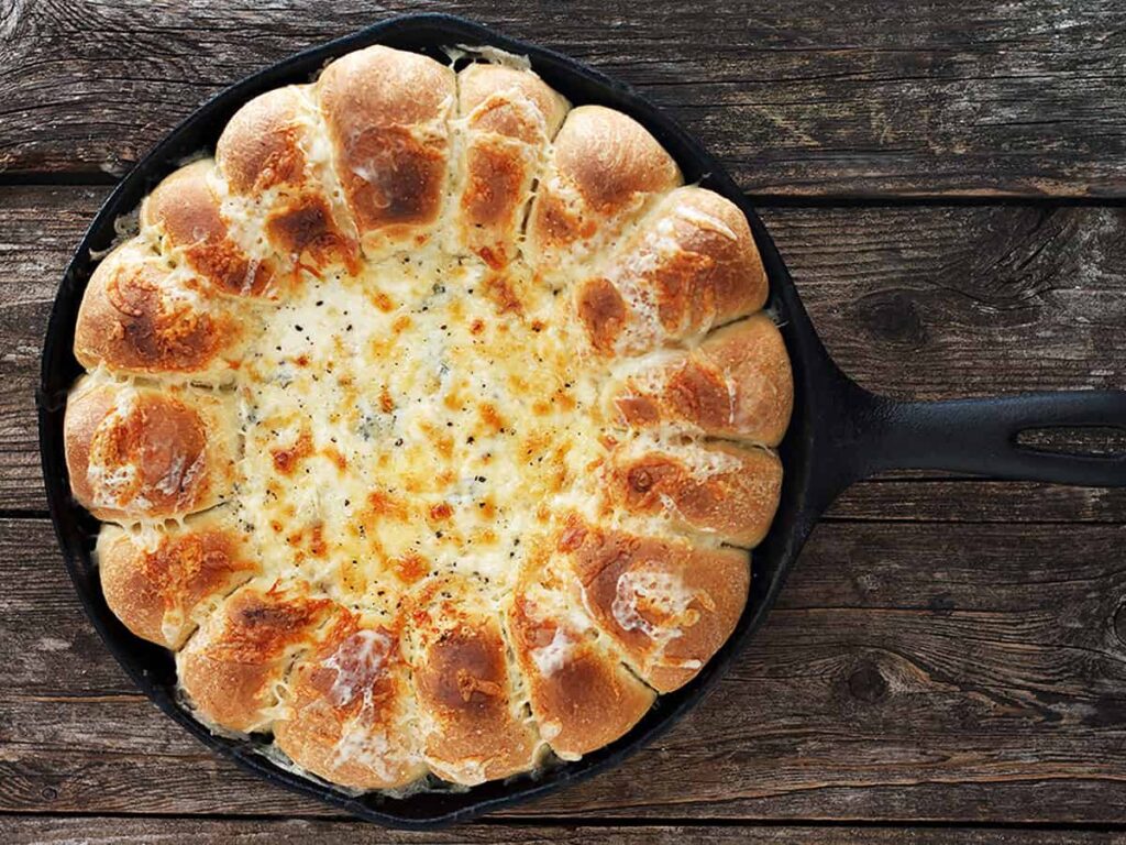 Warm Skillet Bread and Artichoke Dip for the holiday season