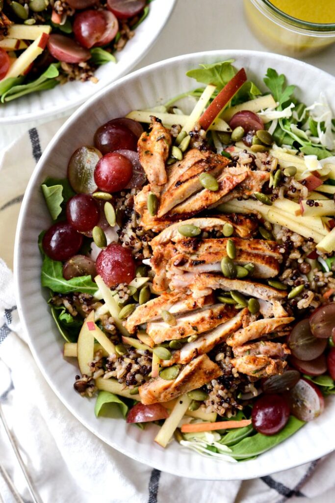 ancient grain arugula salad with chicken drizzled with a simple cider vinaigrette.