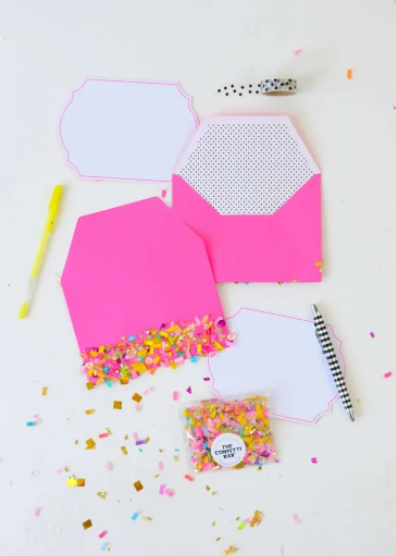 envelopes with confetti