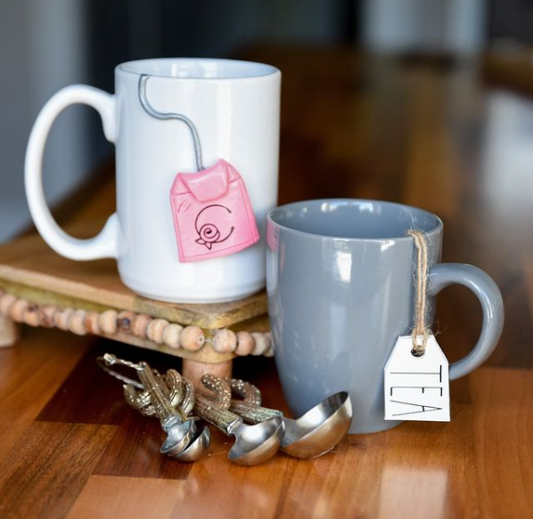 adorable clay teabag embellishments on a mug