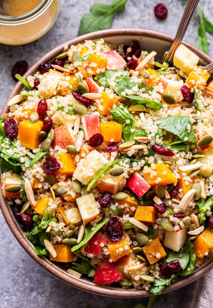 Harvest Quinoa Salad consisting of Butternut squash, apples, dried cranberries, pepitas and toasted almonds tossed in a cider vinaigrette