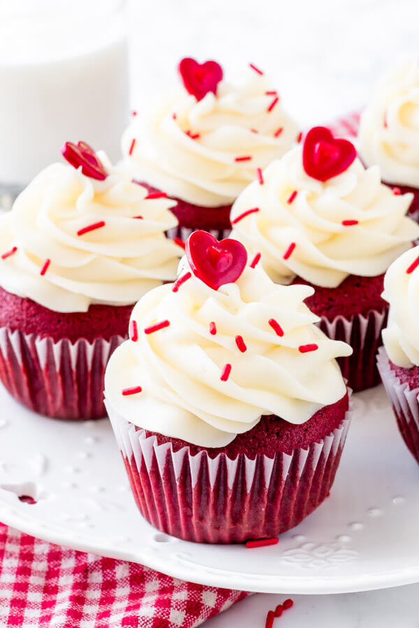 RED VELVET CUPCAKES topped with tangy cream cheese frosting 