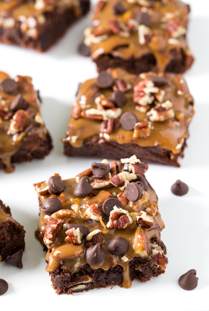 Turtle Brownies topped with pecans and chocolate chips
