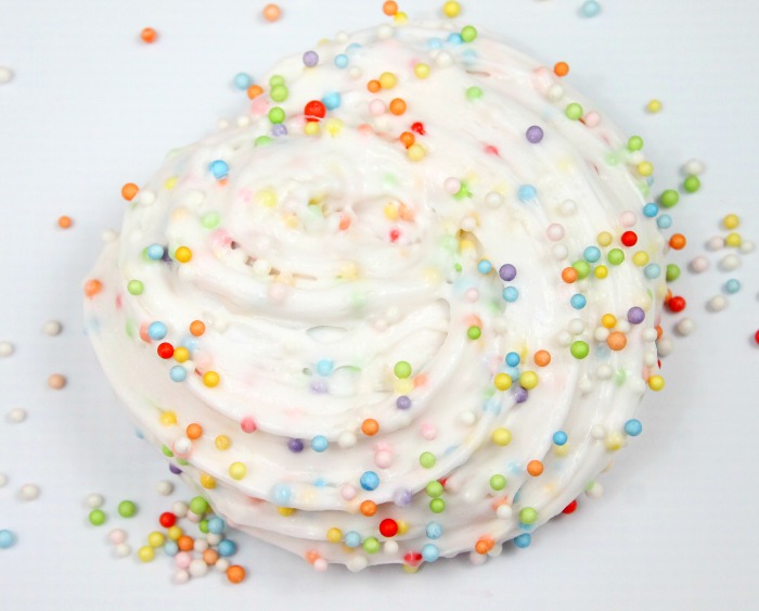 Birthday cake Confetti slime using a white fluffy slime and lot’s of colorful styrofoam balls