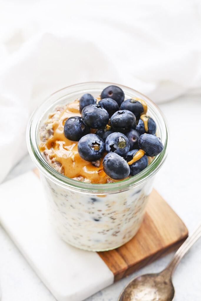 Creamy, delicious meal prep overnight oats with a blueberry muffin