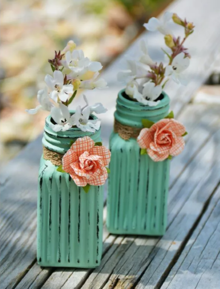 small & sweet vases from salt and pepper shakers found at the Dollar Tree
