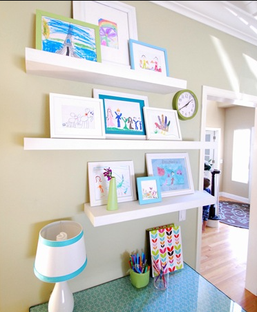 Kids art gallery wall in their playroom