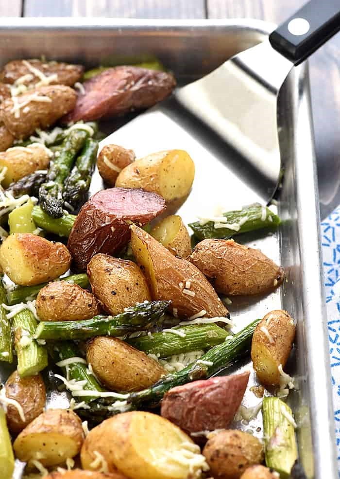 easy, one-pan CHEESY GARLIC ROASTED POTATOES AND ASPARAGUS side dish recipe 