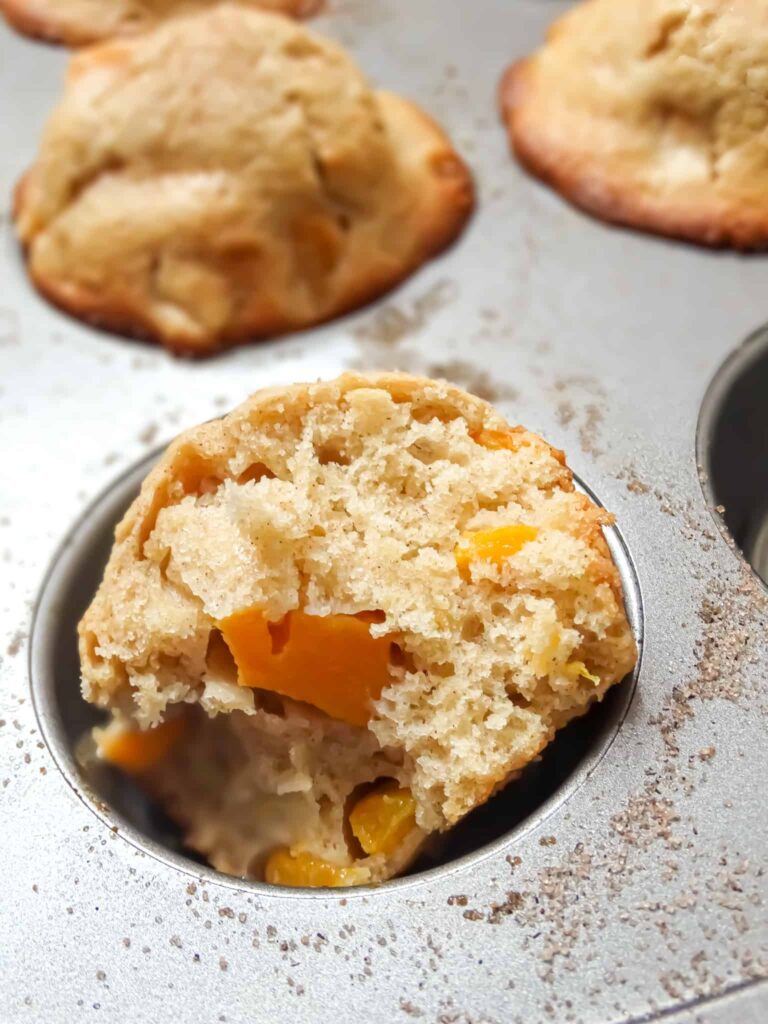 sweet and refreshing Peach Muffins perfectly spiced with warming ginger and aromatic cinnamon
