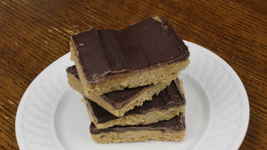 Heavenly No Bake Peanut Butter Bars with melted chocolate on top