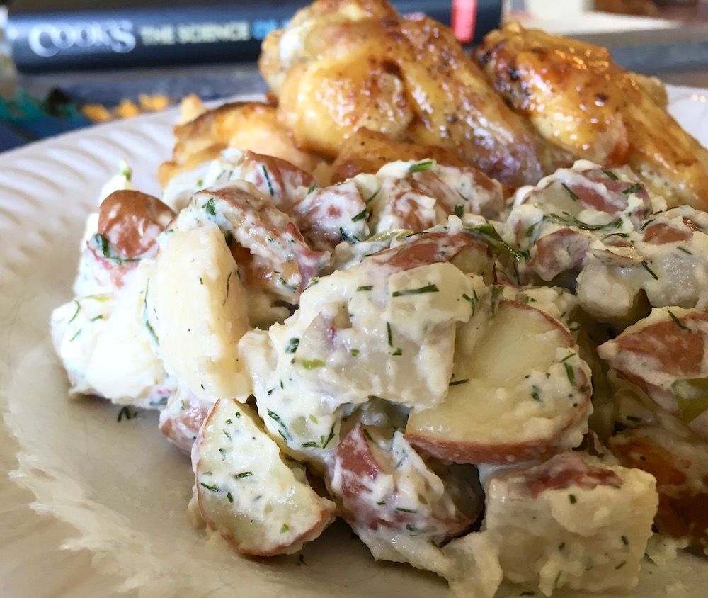 creamy red potato salad with fresh herbs perfect for summer picnics
