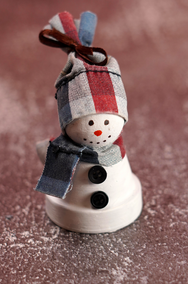 Cute little clay pot snowman