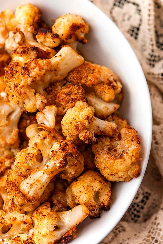 Roasted cauliflower with crispy, sharp white cheddar and freshly grated parmesan fall side dish