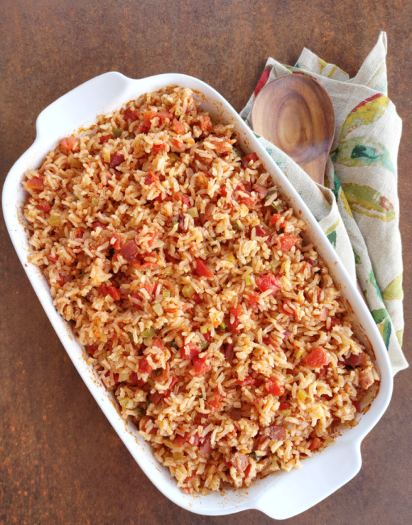 Charleston Red Rice made from rice cooked with bacon and tomato broth seasoned with peppers and onions