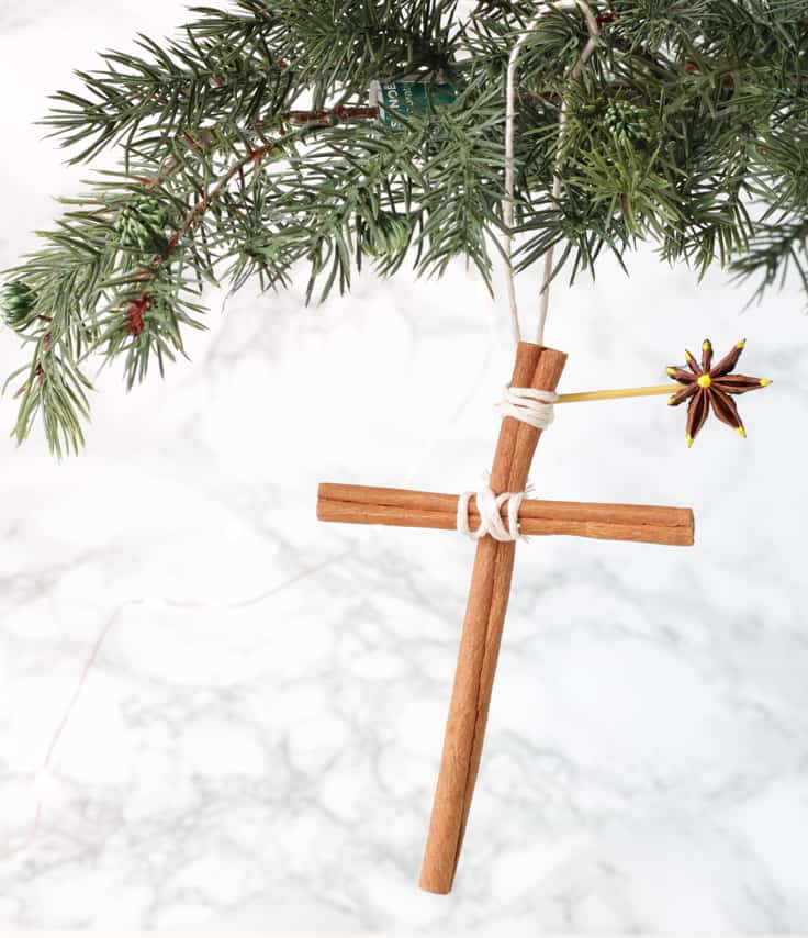 homemade Christmas ornaments made from cinnamon stick crosses with an anise star