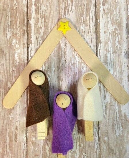  DIY clothespin nativity scene with a Popsicle stick stable a great Christmas craft for kids