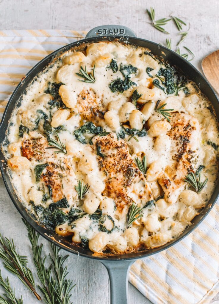 Creamy Chicken Gnocchi Bake made with pillow-soft gnocchi, rosemary garlic marinated chicken and a rich cream sauce studded with tender baby spinach