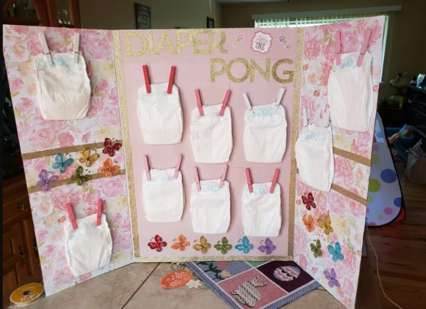 Diaper pong baby shower game