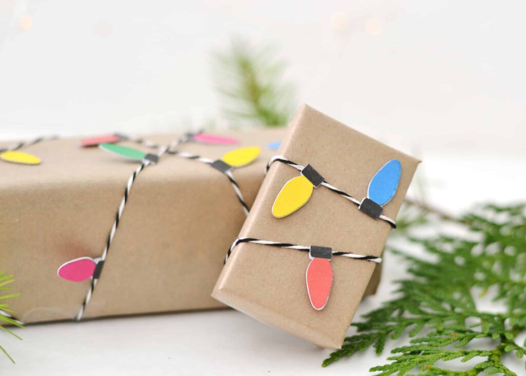 festive and fun Christmas light gift wrap. The light bulb is made of kraft paper and twine