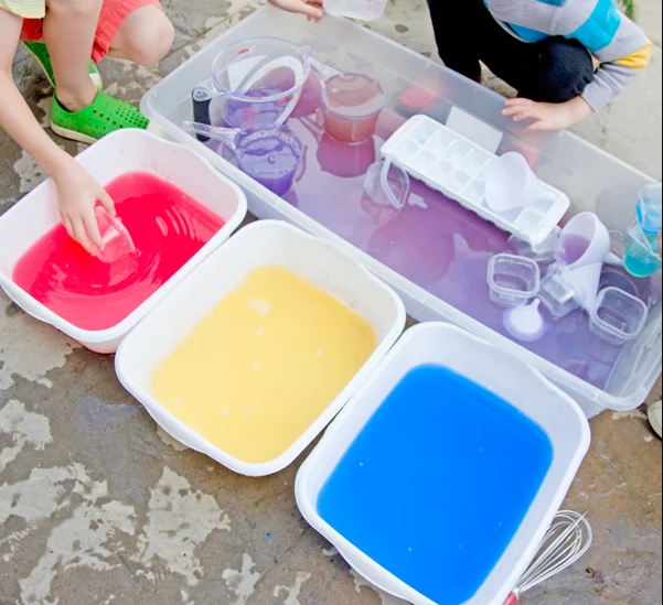 Painted dyed water an outdoor sensory activity