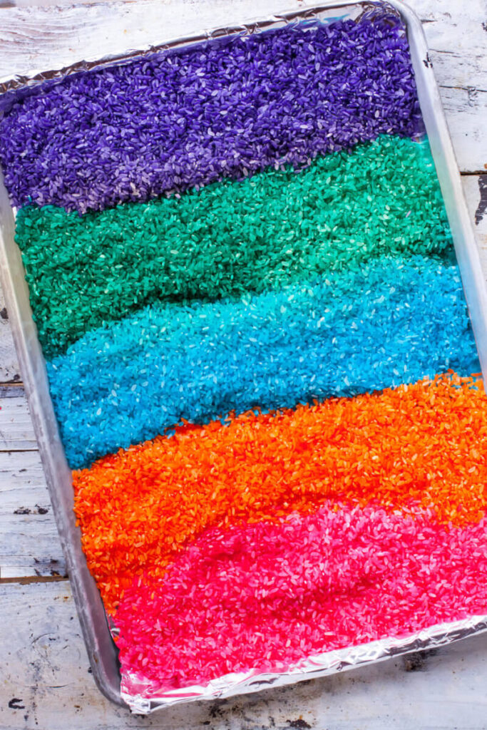rainbow rice sensory bin a fun way for kids to explore textures and colors