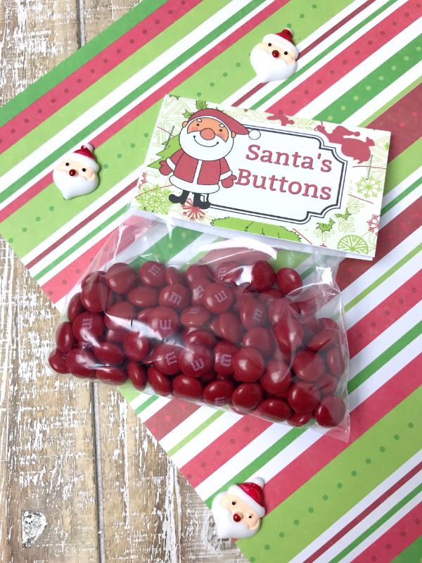 Santa’s Buttons Treat Bags full of red M&M candies