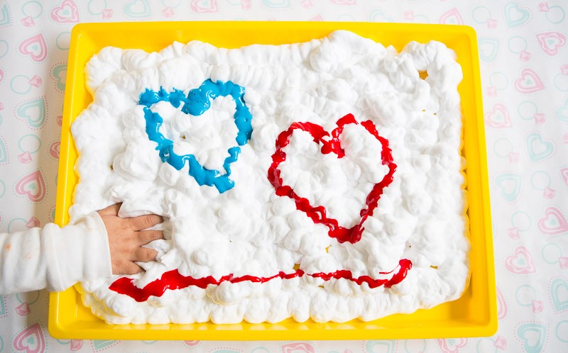 Heart designed shaving cream painting process art activity for kids