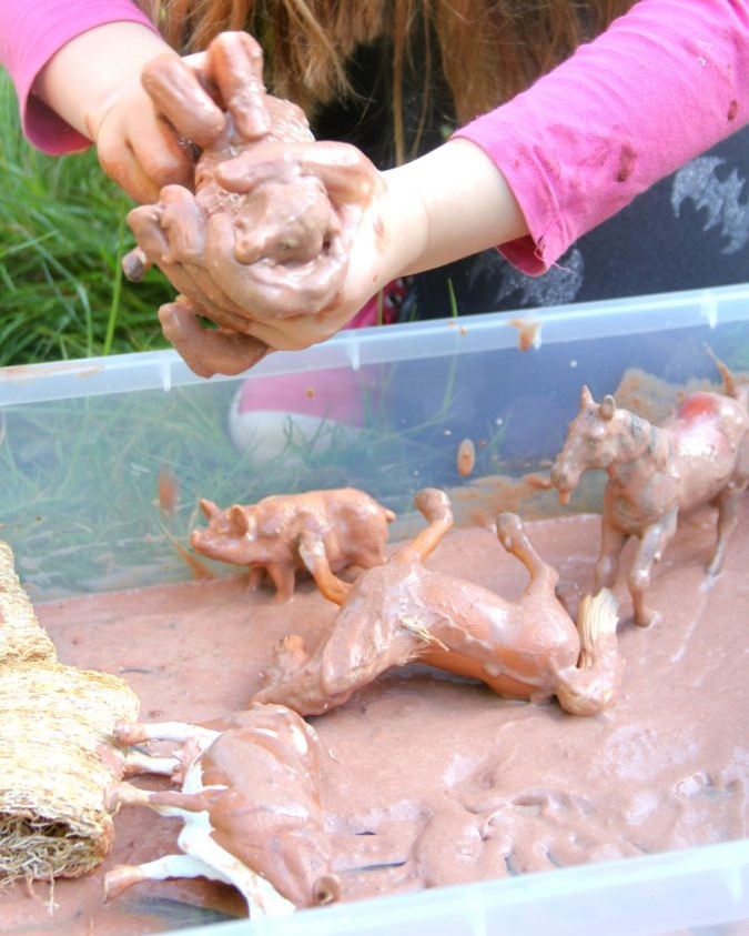 wash the muddy farm animals sensory play