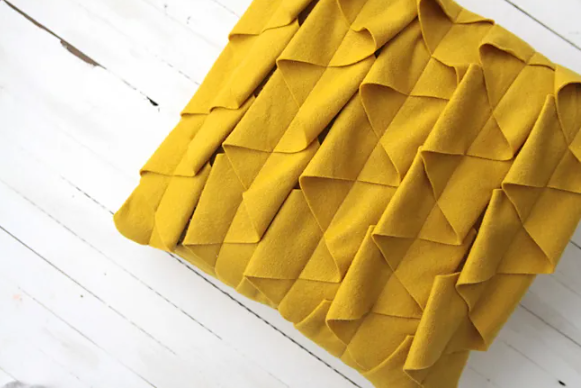 Yellow ruffle pillow