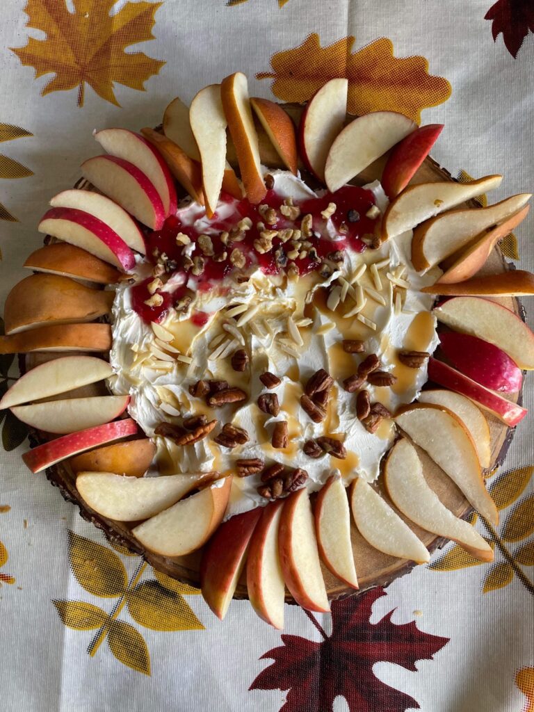 ream cheese board serve with slices of apples