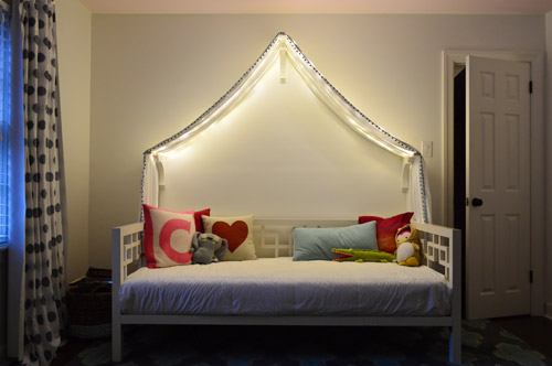 Canopy bed with fairy lights
