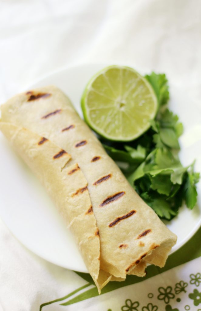 Grilled Green Goddess Wraps filled with a lima bean spread, broccoli, and hearts of palm